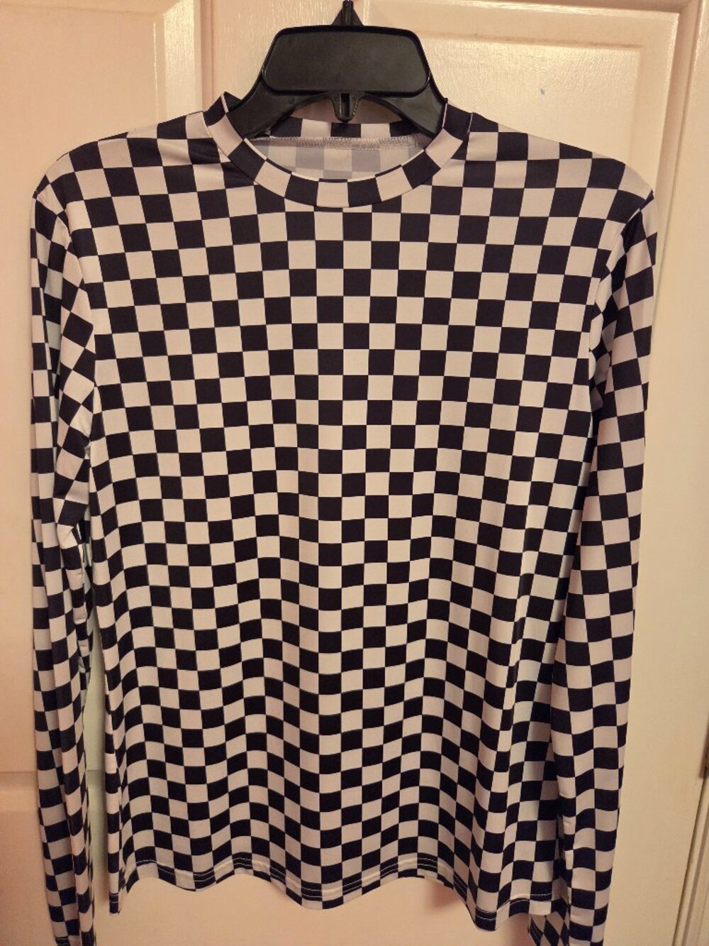 Black and white checkered shirt.